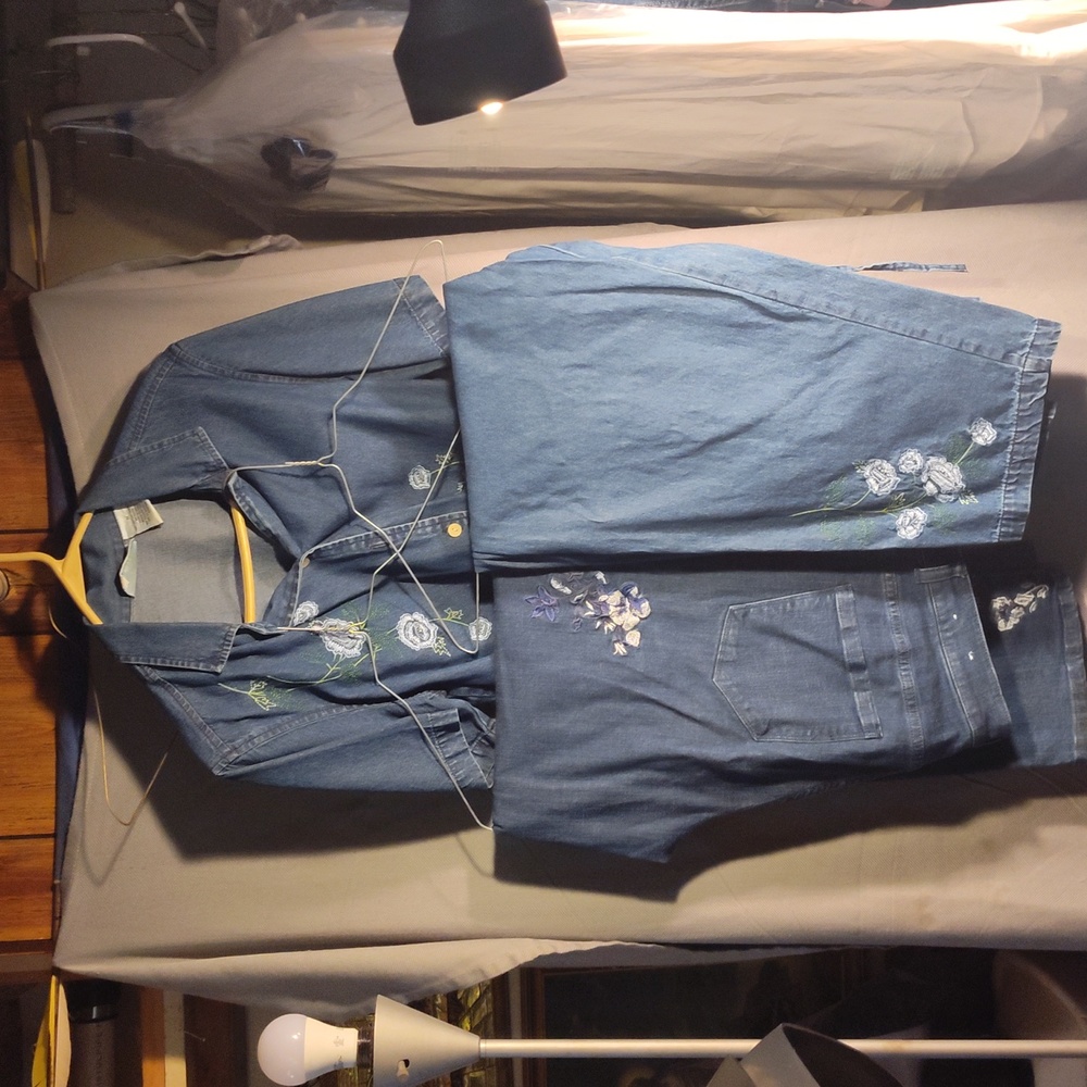 Woman's 3 piece outfit, embroidered flowers jacket and two pairs  of blue jeans,